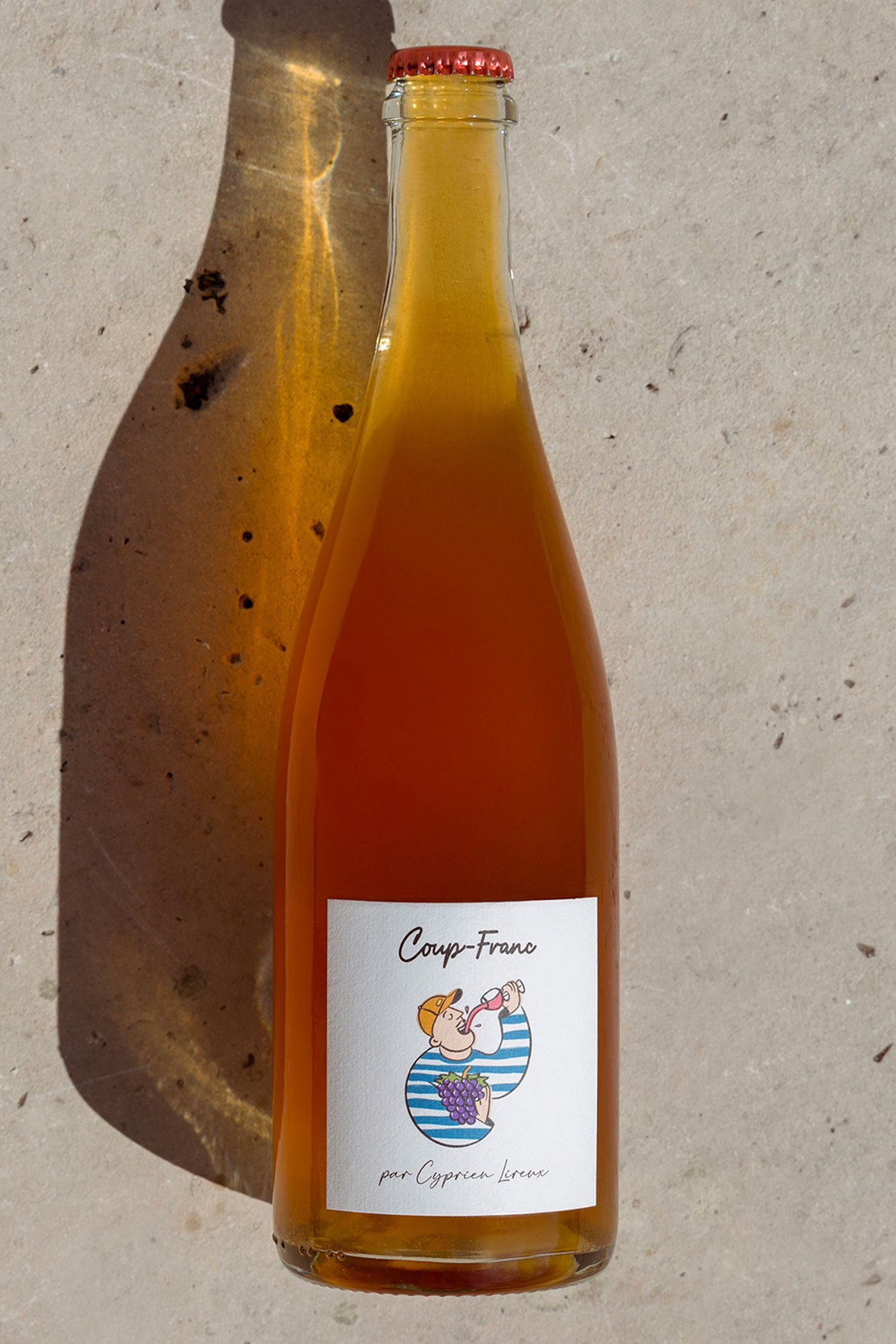 Coup-Franc — bottle of Cabernet Franc co-ferment in warm sunlight