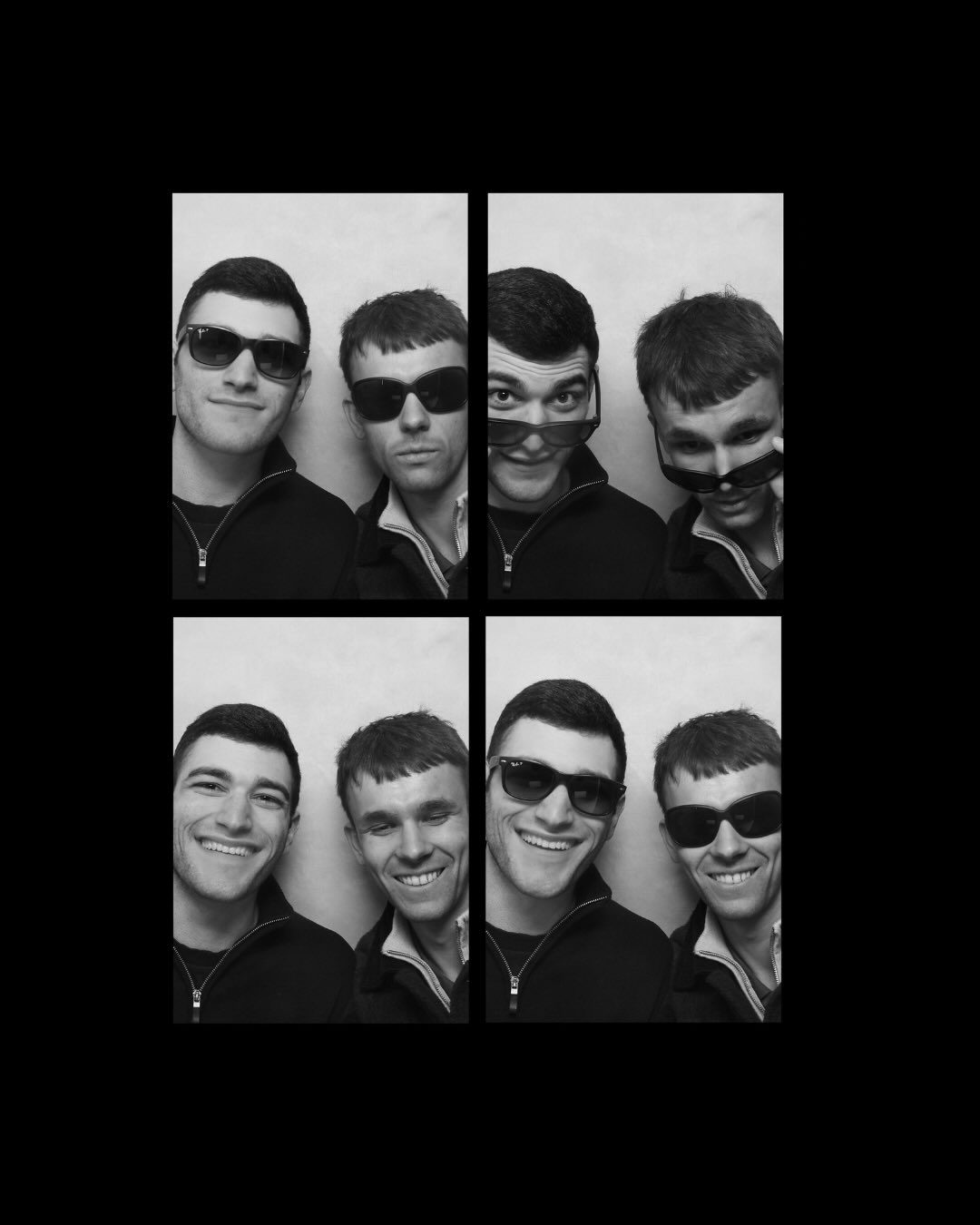 A black and white photo booth strip: four frames of Jack and Yiannis larking about, a pair of sunglasses passing between them